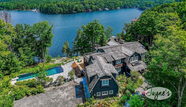 Exquisite 8 bed, 7 bath cottage on Lake Joseph boasting infinity pool + hot tub!