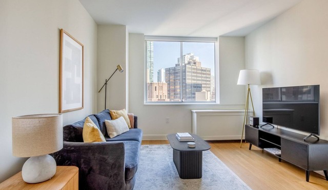 Hip Midtown East 2BR w/Gym, Doorman & W/D, nr Parks, by Blueground
