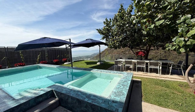 Luxury 5-BR villa with private chef, lake views & heated pool