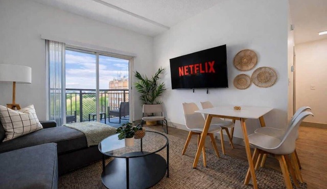 Modern 4BR with Balcony and City Skyline Views
