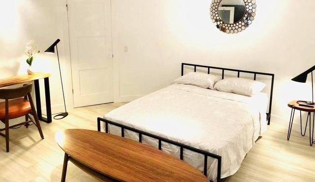 Modern luxury studio nested in a lush cul de sac
