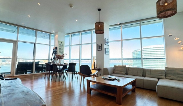 Oceanview 2BR Bliss in Al Raha – Pool & Balcony!