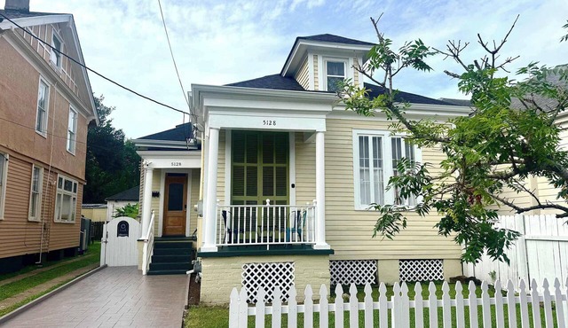 Prime Uptown Villa with Backyard and EV Parking