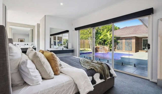 Resort-style family retreat with pool, gym & basketball