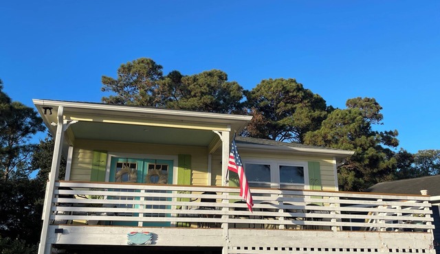 "Semi-soundfront beach cottage with beautiful water views and pool access!