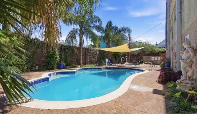 Spacious 11BR Frenchmen Street stay with shared pool, hot tub, parking, and easy walk to the French Quarter.