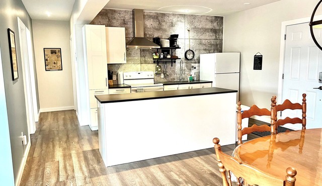 SUTTON - CONDO IN THE HEART OF THE VILLAGE