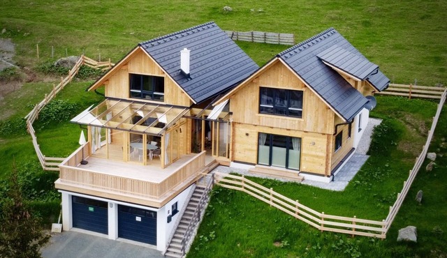 Two linked chalets with sauna in a ski area