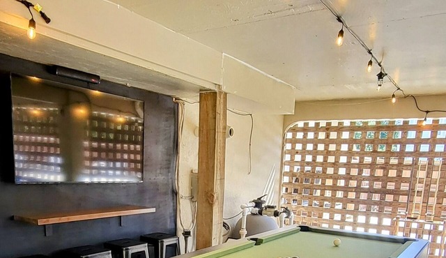 Updated beach house with private pool, hot tub, and community fitness center!