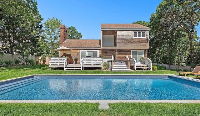 Walk to private beach & unwind in a heated pool + spa at this beautiful retreat!