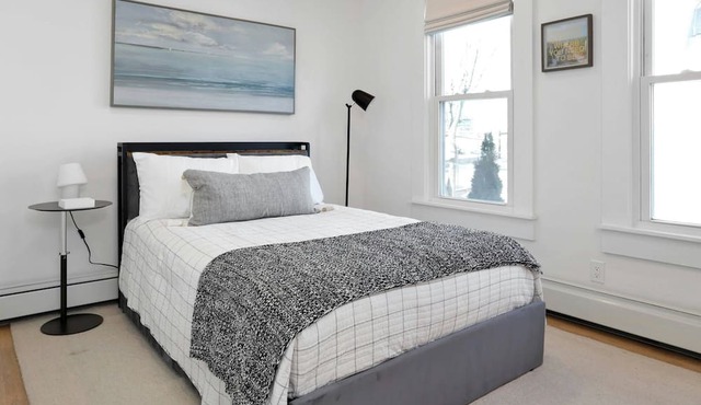 Stylish 3BR/2BA Retreat #3, Harbor Point – Walk to Train, Cafes & Restaurants, City + Shore